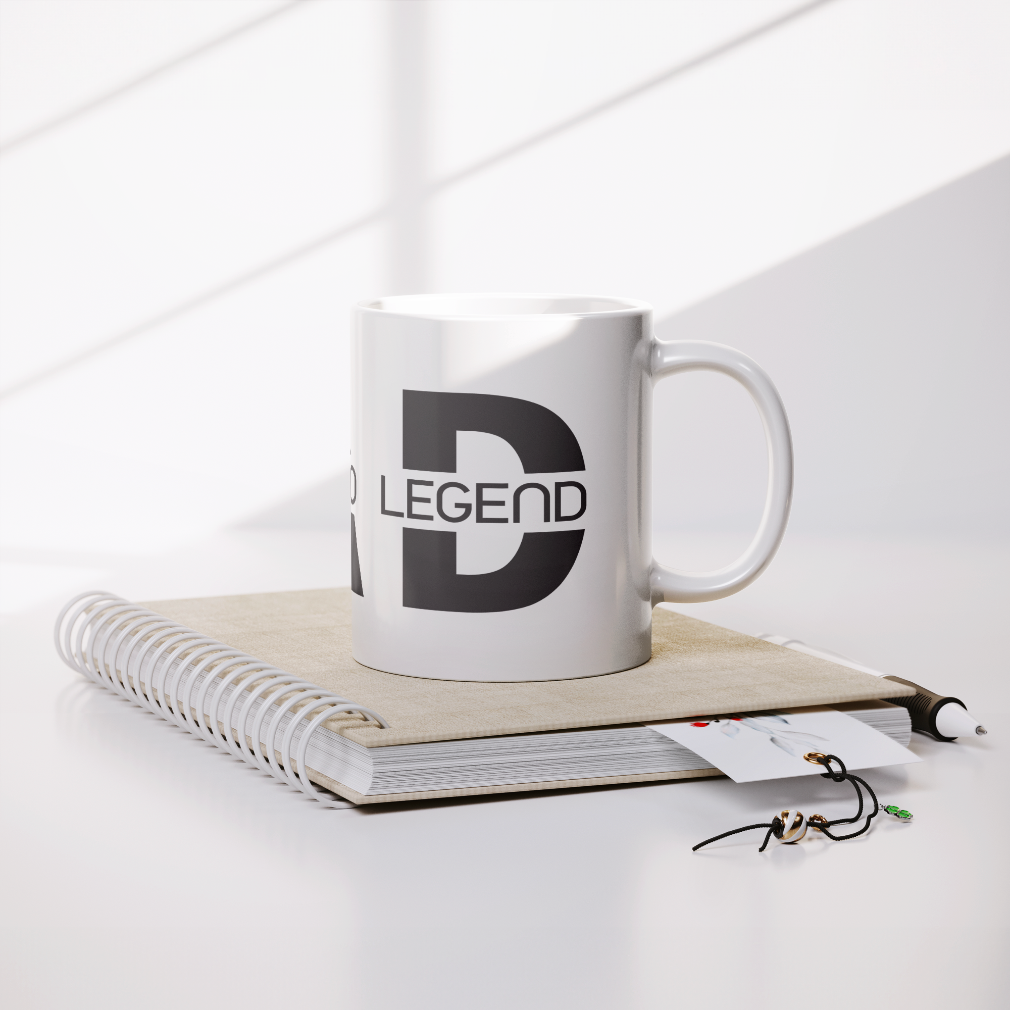 Dad_Husband_Hero_Legend_Mug_-_11oz_Coffe_Lifestyle_Notebook_Mockup.png