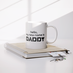 Hello_My_New_Name_Is_Daddy_Mug_-_11oz_Ne_Lifestyle_Notebook_Mockup.png