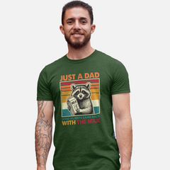  t-shirt with retro raccoon holding milk carton and text ‘Just a Dad Who Always Came Back With the Milk’ in vintage sunset colors