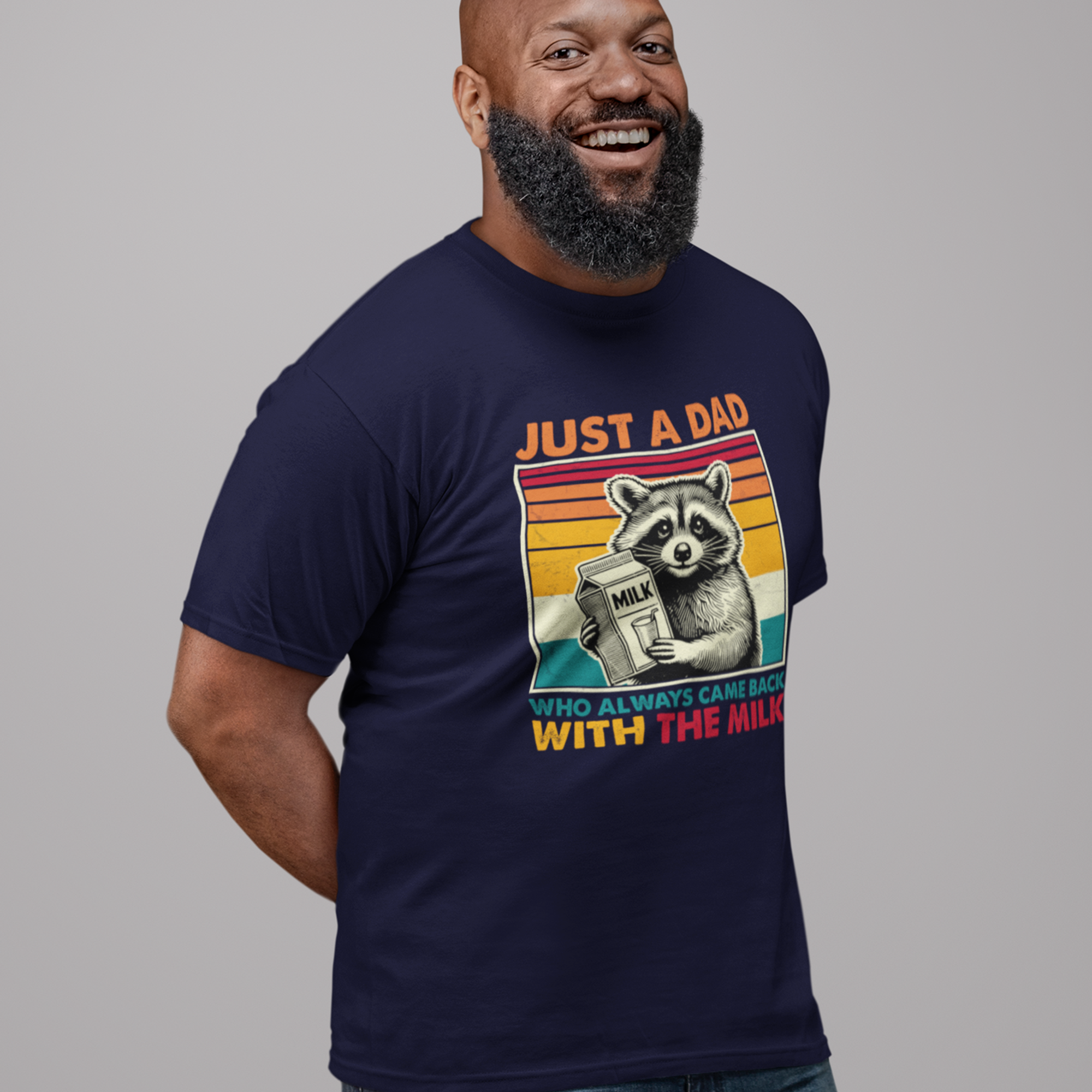  t-shirt with retro raccoon holding milk carton and text ‘Just a Dad Who Always Came Back With the Milk’ in vintage sunset colors