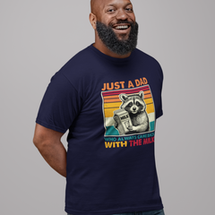  t-shirt with retro raccoon holding milk carton and text ‘Just a Dad Who Always Came Back With the Milk’ in vintage sunset colors