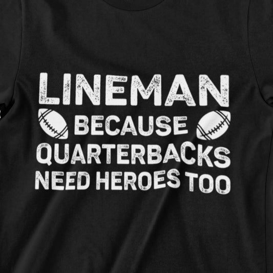 t-shirt with white distressed text "Lineman Because Quarterbacks Need Heroes Too" and football graphics