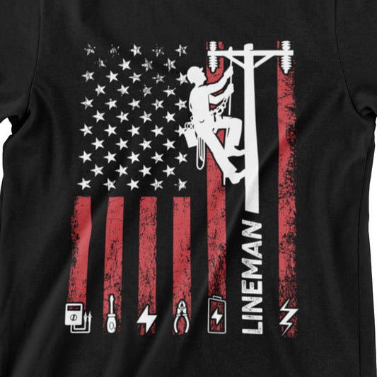 American Lineman T-Shirt with distressed US flag and lineman climbing utility pole graphic