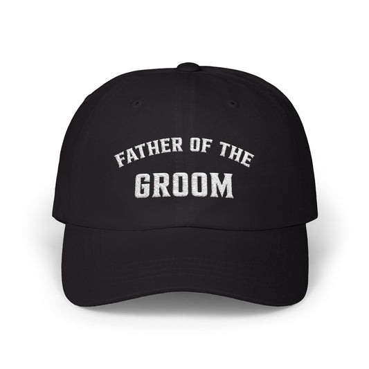 Man wearing a black baseball cap with bold white embroidered text that reads "Father of the Groom" – ideal for wedding day accessories.