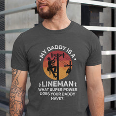 My Daddy Is A Lineman T-Shirt featuring vintage lineman silhouette climbing utility pole with sunset background