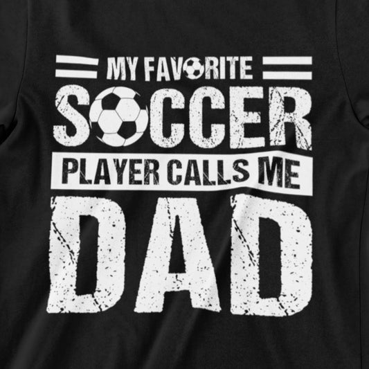 My Favorite Soccer Player Calls Me Dad T-Shirt - Bold Text and Soccer Ball Design