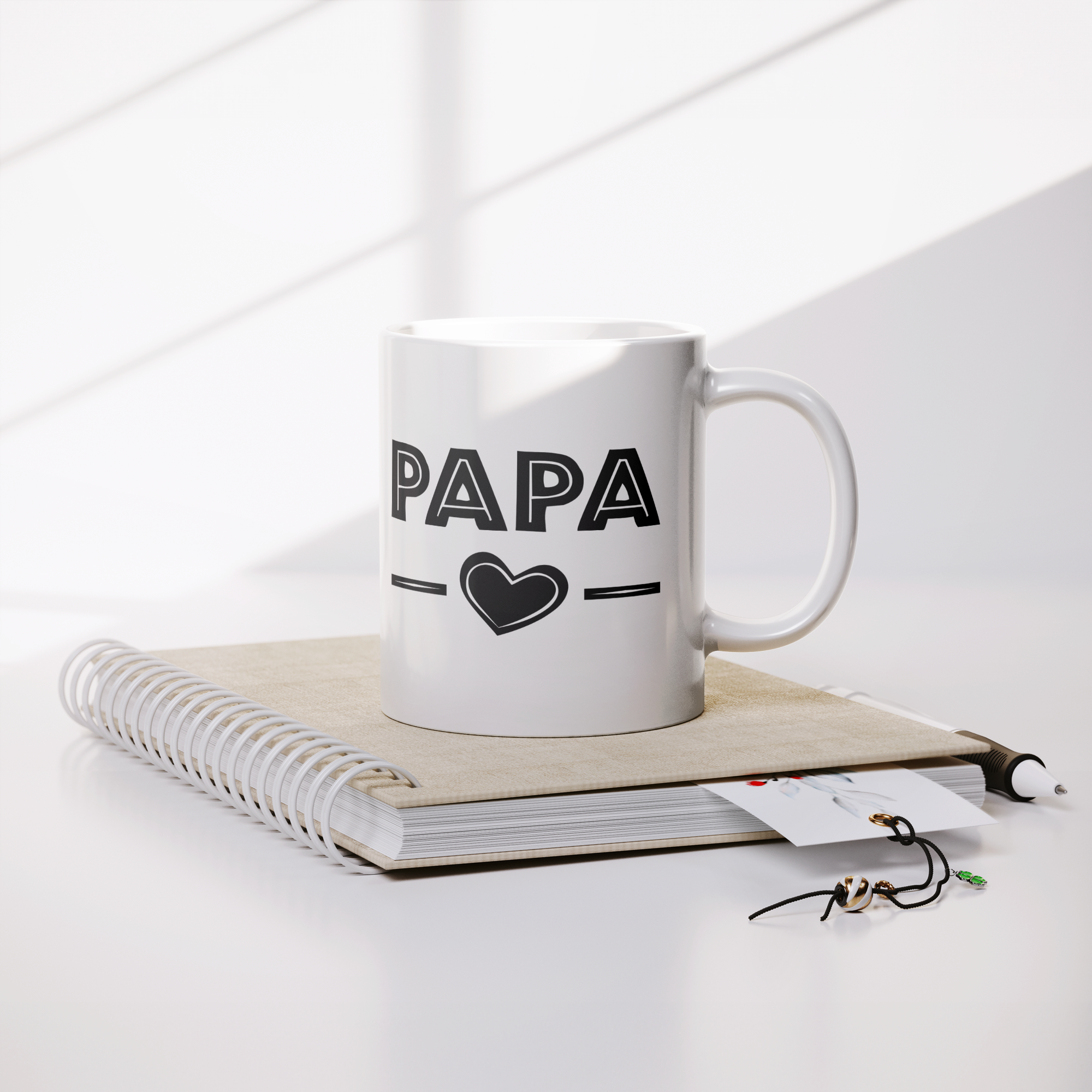 Papa_Mug_with_Heart_-_11oz_Coffee_Cup_Gi_Lifestyle_Notebook_Mockup.png