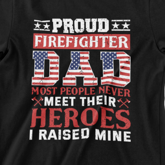 Proud Firefighter Dad shirt with patriotic American flag text, axes, and quote 'I raised my hero