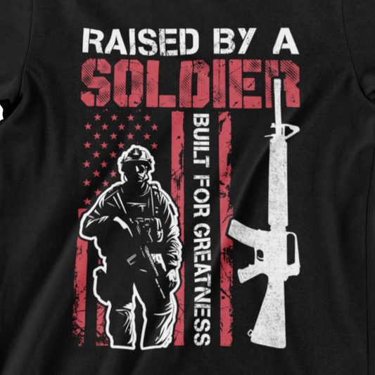 ‘Raised by a Soldier, Built for Greatness’ text, American flag, soldier silhouette, and vertical rifle graphic