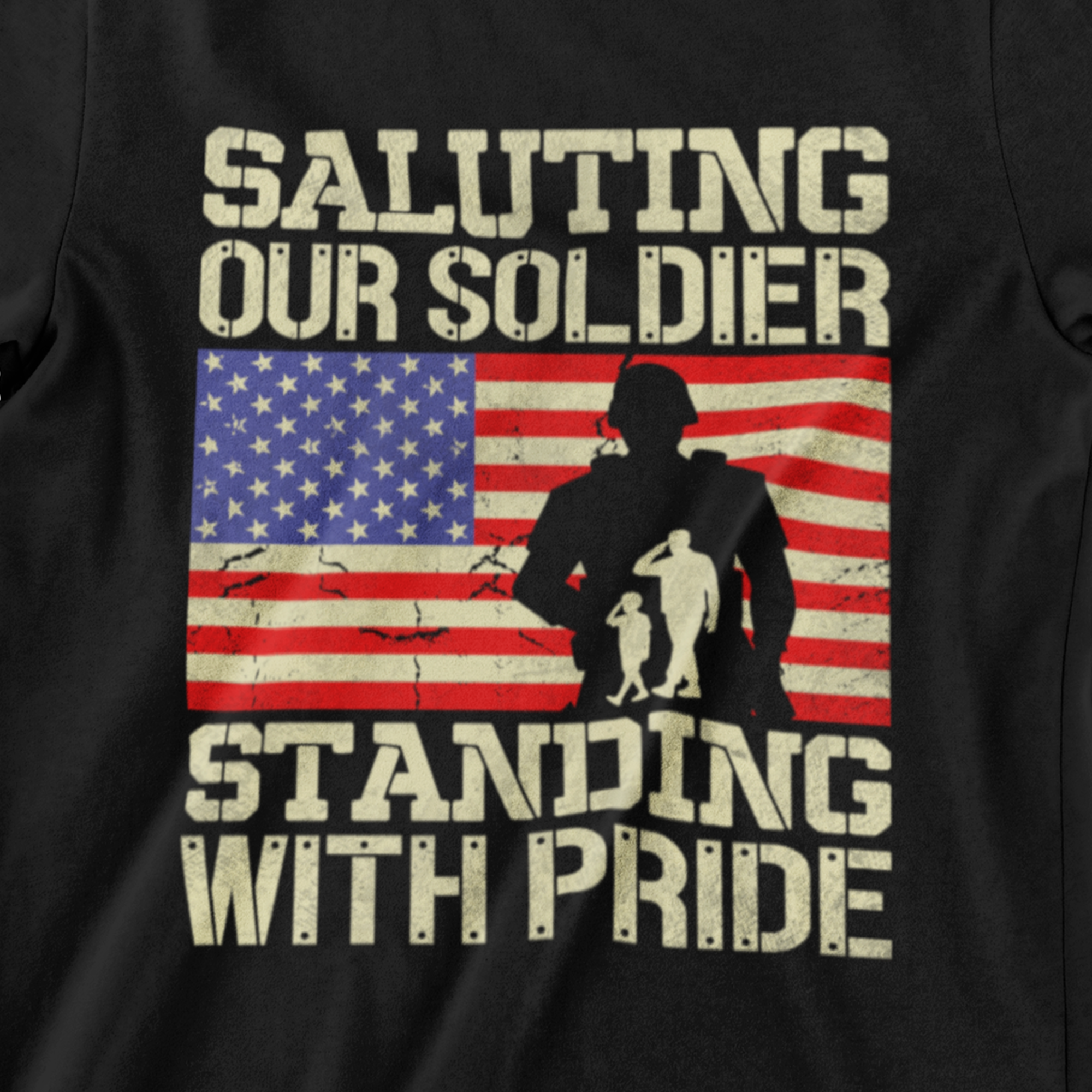 ‘Saluting Our Soldier Standing With Pride’ text, American flag background, and soldier silhouette with saluting family