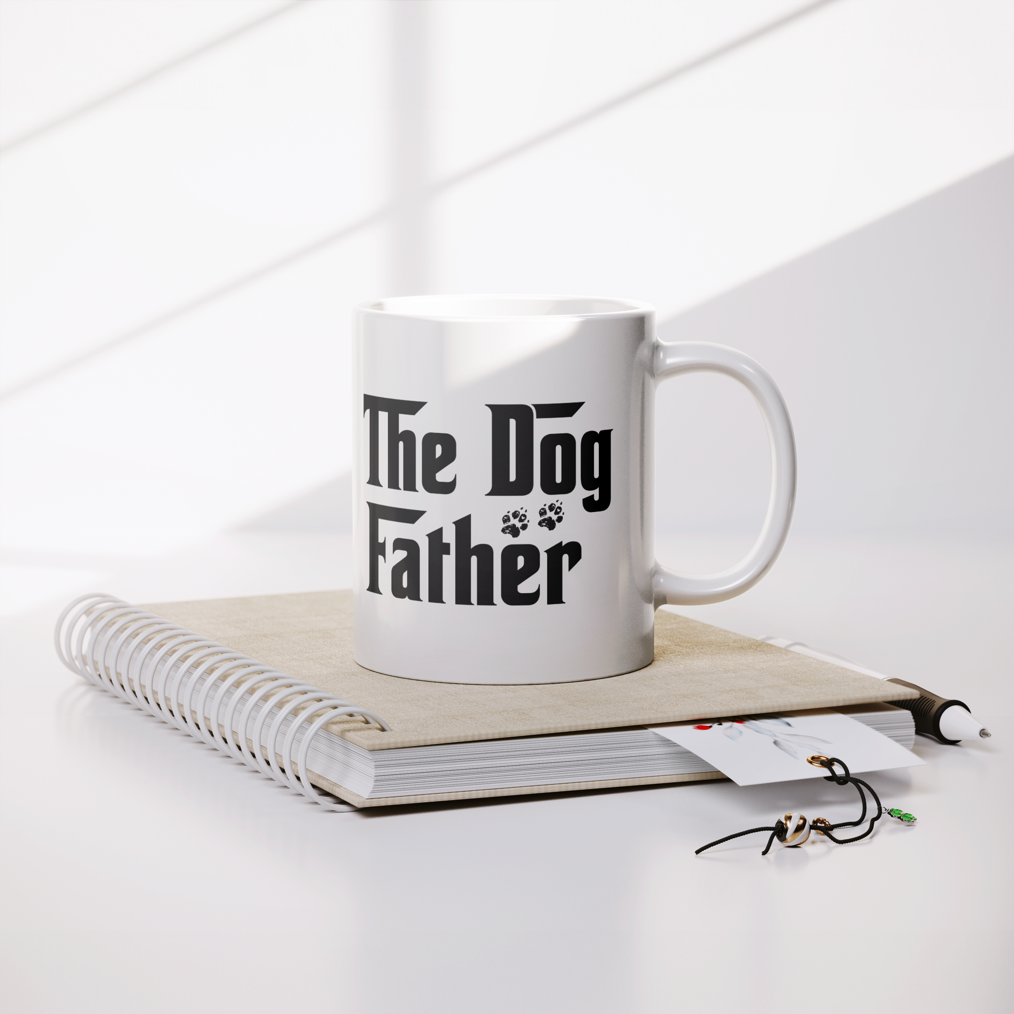 The_Dog_Father_Mug_-_Funny_Dog_Dad_11oz__Lifestyle_Notebook_Mockup.png