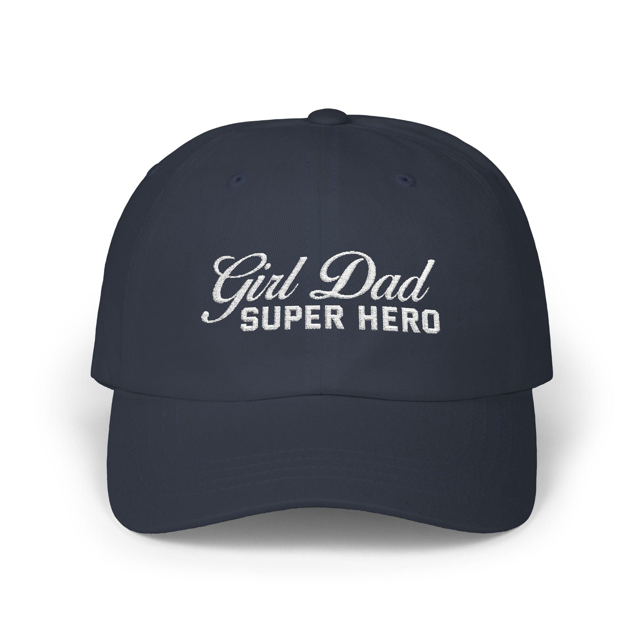 Woman wearing a black hat with mixed-script embroidered text reading “Girl Dad Super Hero” standing against a chain-link fence